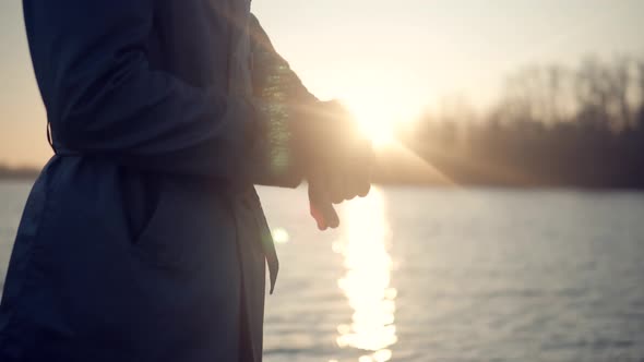 Businessman Checking Time On Watch And Looks At Clock. Man Looking On Watch At Sunset.