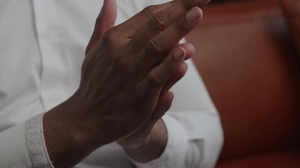 Close Up of Man's Hands Squashed in Relief in Slow Motion