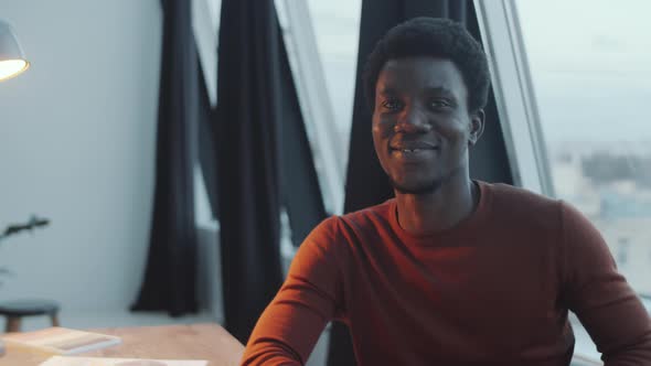 Portrait of Positive African Man in Office