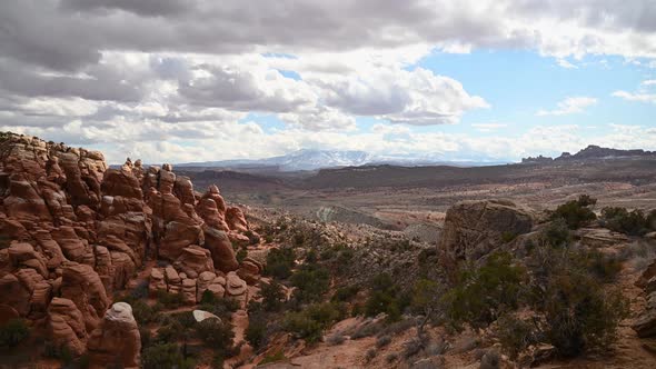 View of the Fiery Furnance with the La Sal Mountains in the distance, time lapse