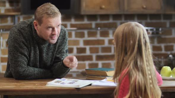 Father Scolding His Lazy Daughter for Bad Grades