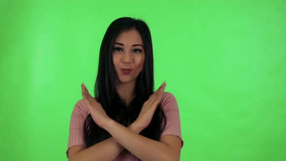 Young Attractive Asian Woman Disagrees - Green Screen Studio