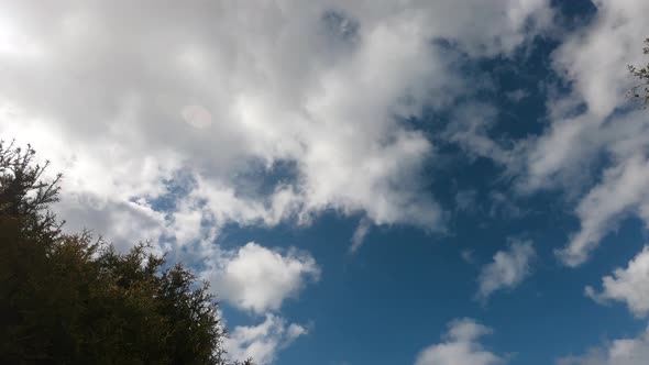 Timelapse of clouds passing on a bright sunny day