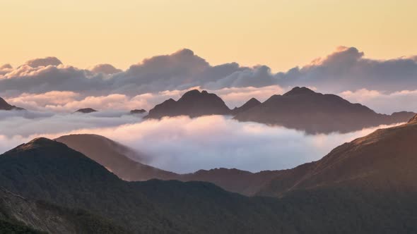 Sunset Evening Clouds in Misty Mountains Nature in New Zealand Wilderness