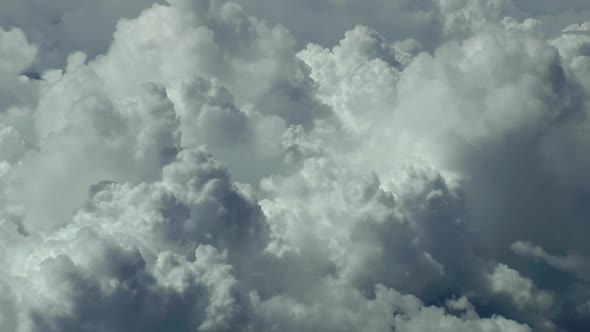 Flying above stormy clouds, Actual airplane, high altitude footage.