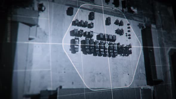 Surveillance system detects multiple military vehicles at the rival army base alt