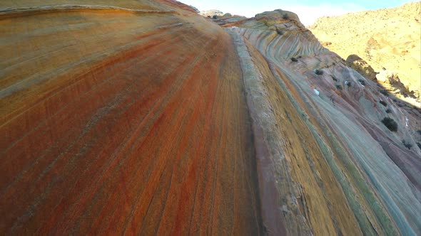 Gliding over the stripes in the sandstone near the Wave.