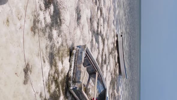 Vertical Video of Low Tide in the Ocean Near the Coast of Zanzibar Tanzania Aerial View