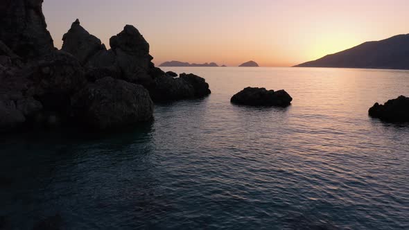 Rock Formation in the Sea at Sunset