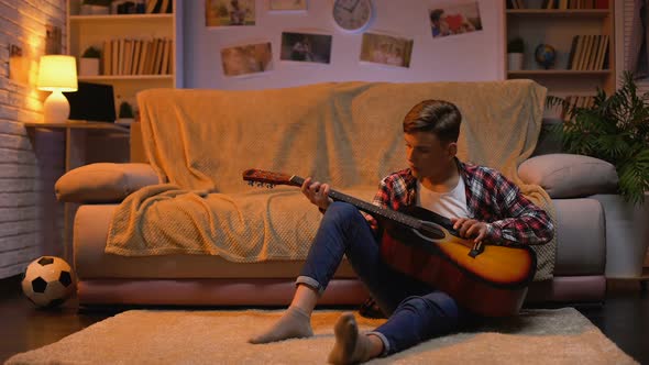 Teenager Studying to Play Guitar Dreaming About Musician Career Hobby, Lifestyle