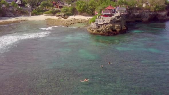 Aerial drone view of the beach at Mahana Point, Bali, Indonesia.