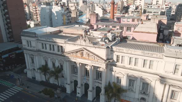 Aerial pan left flying over the Faculty of Economic Sciences, part of the public University of Bueno
