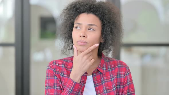 Portrait of Pensive African Woman Thinking