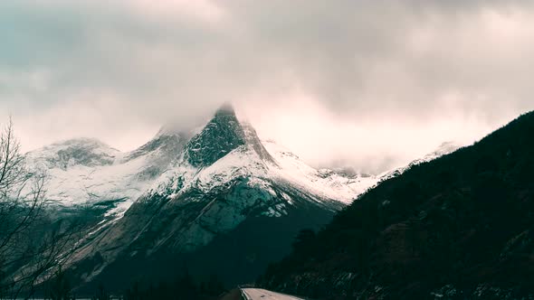 Winter snow on Stetind mountain, Norway; scenic time lapse