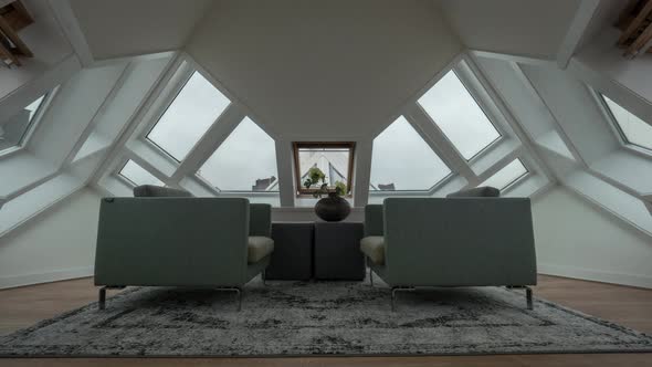 Timelapse of clouds in windows, view inside Cube House