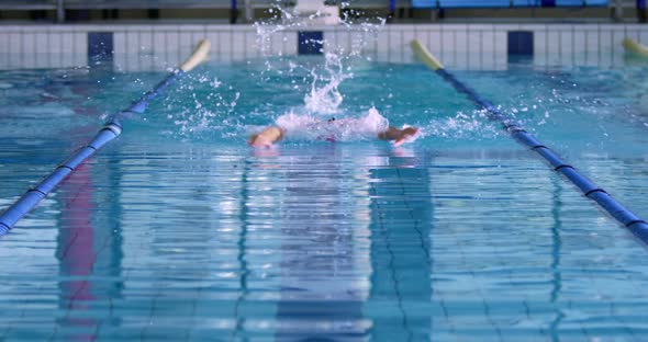 Swimmer training in a swimming pool