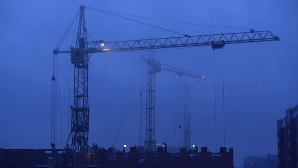 Construction Site at Dusk with Purple Sky