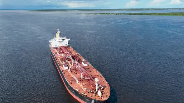 Freight ship sailing at Amazon River Manaus Brazil. Transportation.