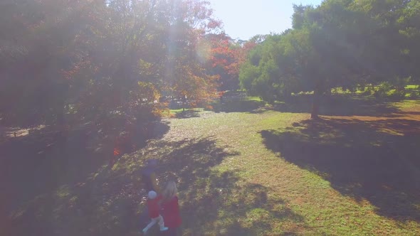 Family walking at park