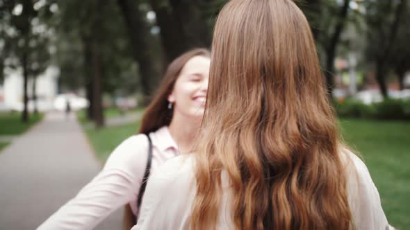 Girls Takes Off Medical Face Masks and Hug