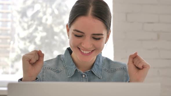 Close Up of Excited Young Girl Celebrating Success