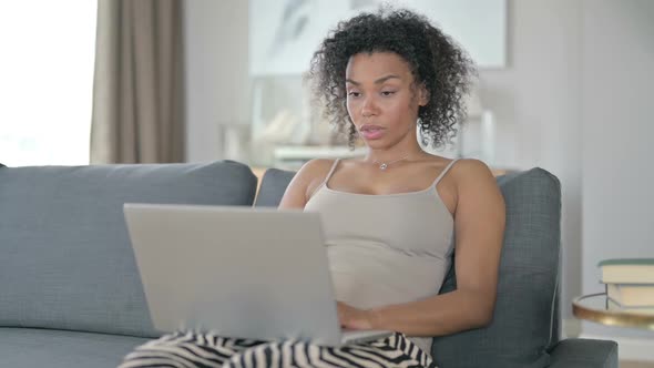 Loss African Woman Reacting to Failure on Laptop at Home