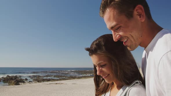 You adult couple relaxing at the seaside