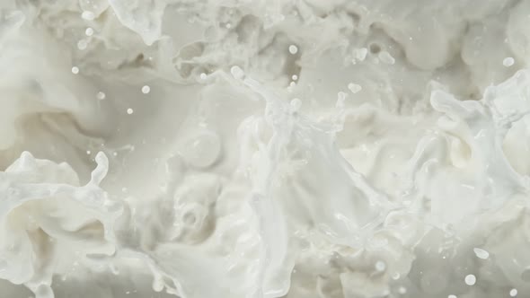 Super Slow Motion Shot of Splashing Fresh Cream at 1000 Fps alt