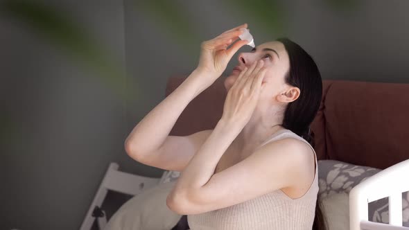 Girl Drops Eye Drops Install Lenses Moisturizing Using Medical Eyes Drops Suffering From Dry Eyes
