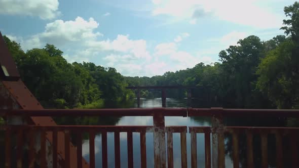 Drone flight over an abandoned bridge in rural Florida.