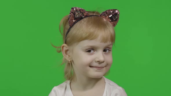 Girl in Cat Headband Winks