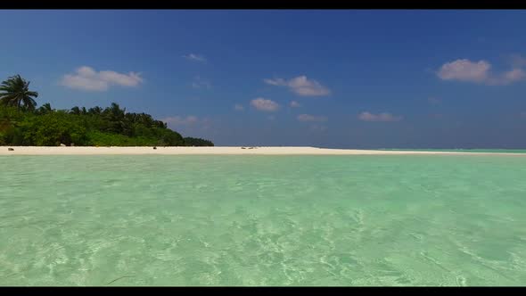 Aerial drone shot travel of beautiful coastline beach adventure by aqua blue sea with clean sandy ba