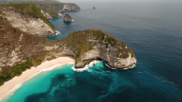 Rocky Cliff with Beach in the Sea. Karang Dawa.