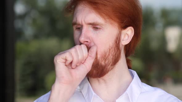 Sick Young Designer Coughing While Standing Outdoor