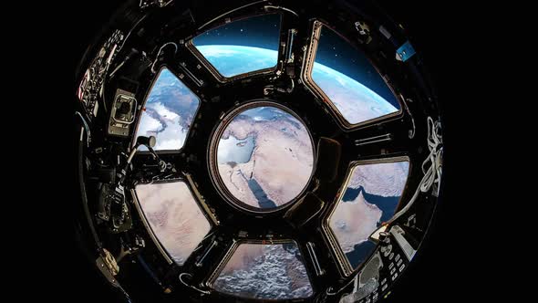 View From A Porthole Of Space Station On The Earth Background