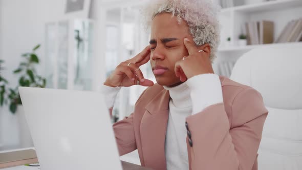 Exhausted Young African American Woman Rubs Temples Sit By Laptop Feel Headache