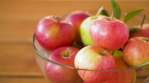 Ripe Apples in Glass Bowl on Wooden Table 53