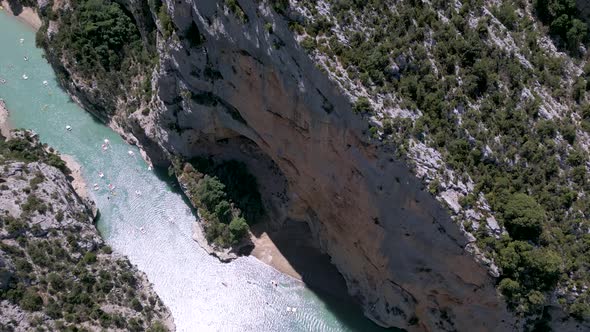 Flying over a huge limestone cliff at Verdon Gorge (Gorges du Verdon), France