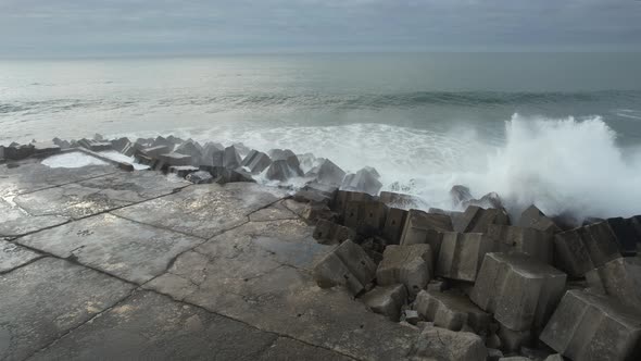 Powerful Waves Crashing on Pier