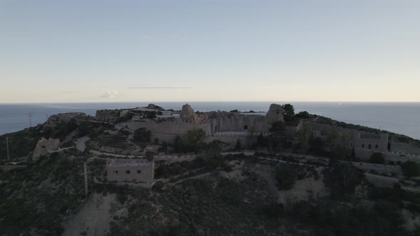 Mountaintop stronghold of Bateria de Castillitos with coastal artillery; drone