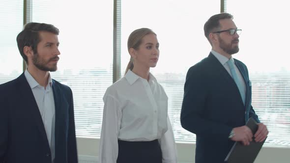 Slow Motion Business Meeting Team of Top Managers is Walk to Meet the Interior of a White Office