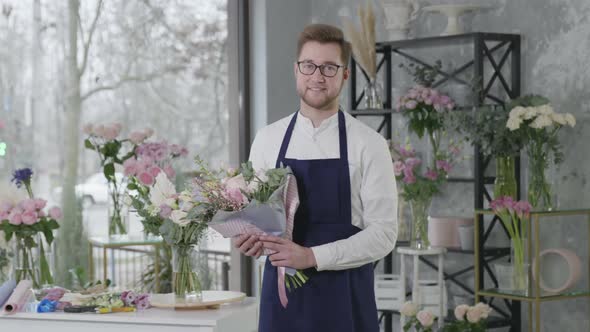 Bouquet of Flowers Working in Flower Shop, Successful Businessportrait of Smiling Attractive Boy