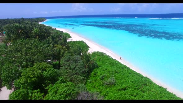 Aerial view texture of beautiful lagoon beach holiday by blue sea with bright sand background of adv