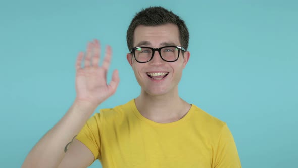 Man Waving Hand To Welcome, Blue Background
