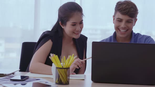 Creative Business People Group Having Conversation at Office Desk in Workplace