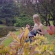 Beautiful Young Woman Plays a Hang in the Autumn Park - VideoHive Item for Sale