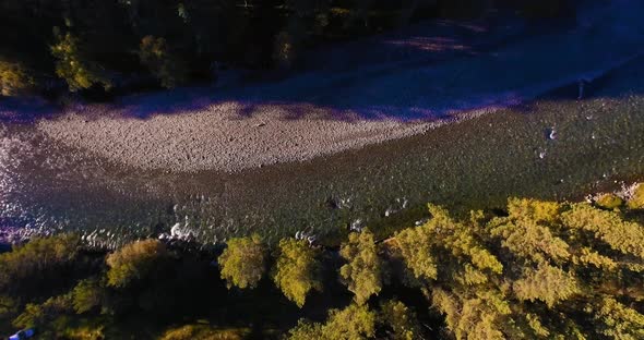 Mid Air Flight Over Fresh and Clean Mountain River at Sunny Summer Morning