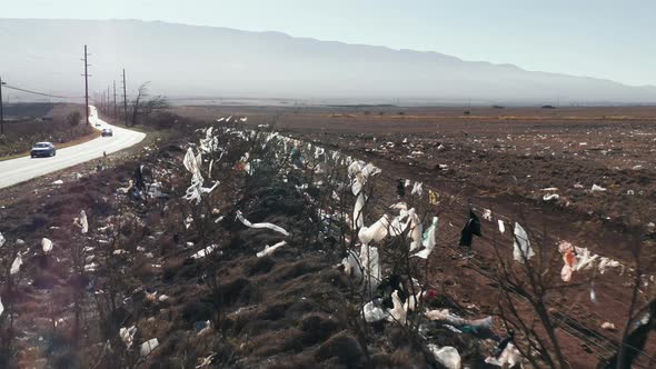 Plastic Pollution Trash on Countryside Field with Different Kinds of Garbage