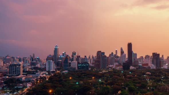 Day and night transition time lapse of cityscape and buildings in metropolis