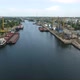 Aerial Shot of Dnipro Tributory Full of Barges and Boats on a Sunny Day in Summer - VideoHive Item for Sale